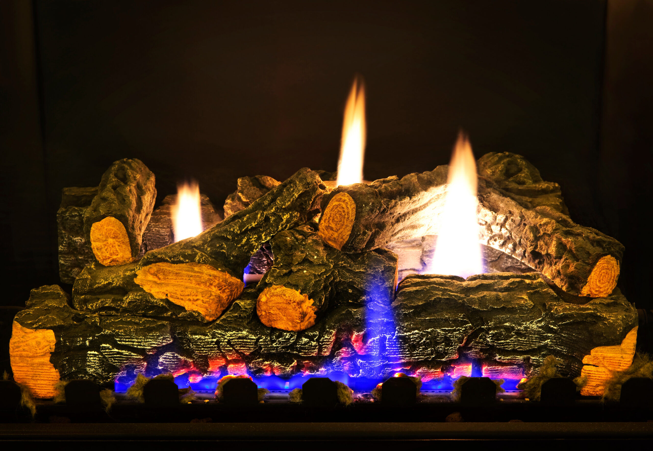 Adobe Stock image of a gas logs on fire.